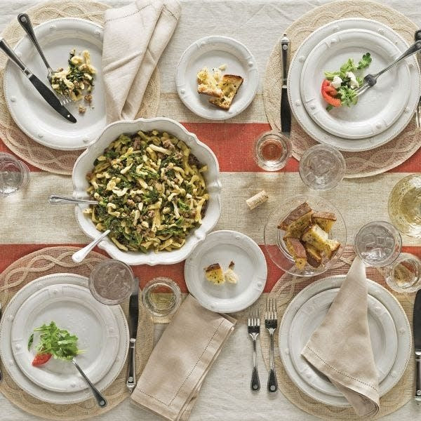 Five-piece stainless steel place setting in berry satin finish with classic French-inspired silhouette.