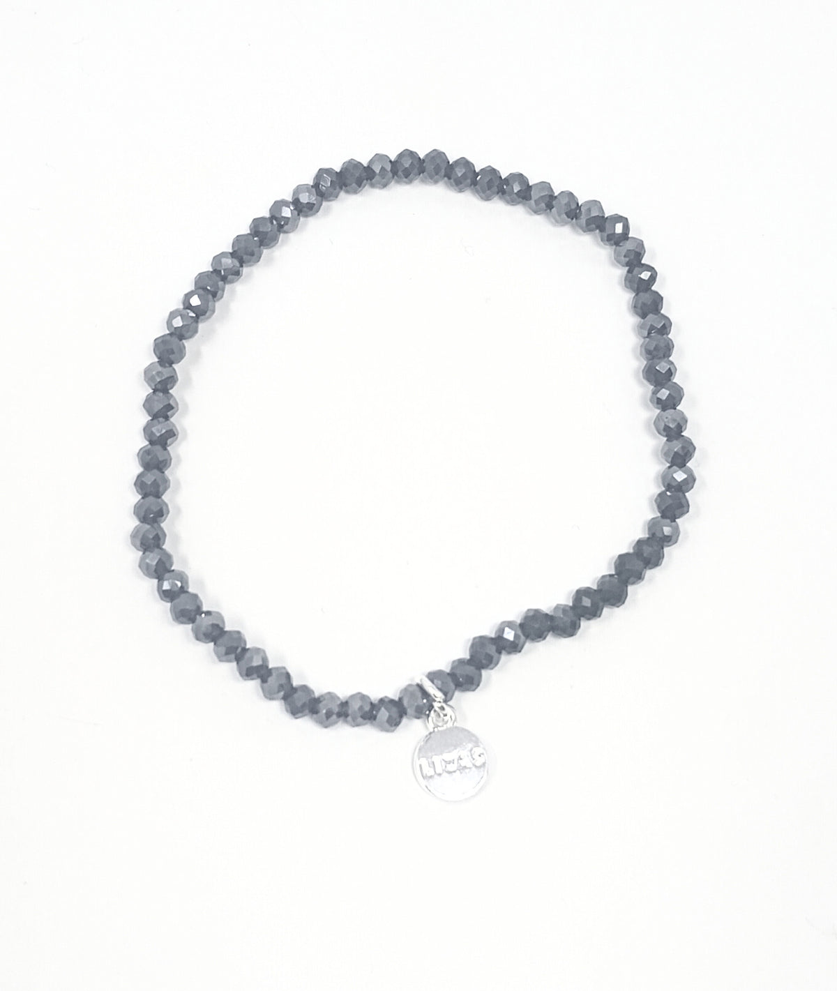 Stretchy beaded bracelet with faceted glass beads in a colorful pattern.