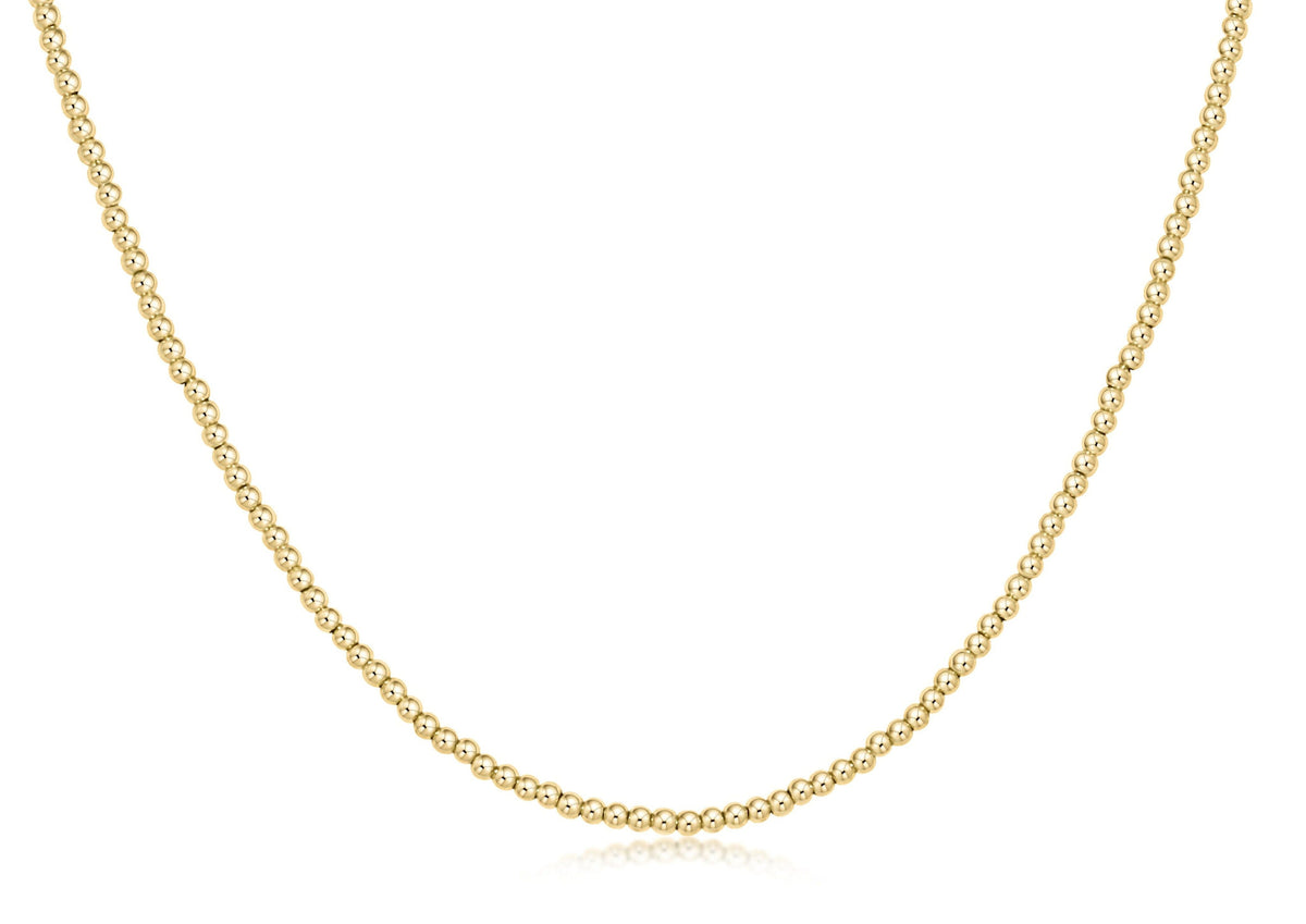 Classic gold-filled choker necklace featuring a continuous strand of small round beads.