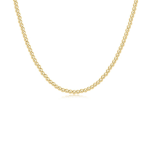 Classic gold choker necklace featuring a continuous strand of small round beads.