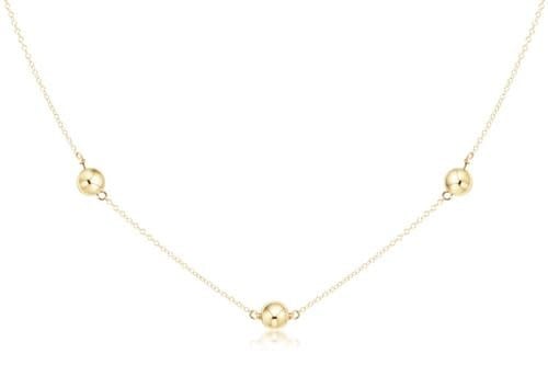 Gold-filled choker necklace with a classic chain link style featuring six-millimeter round beads.