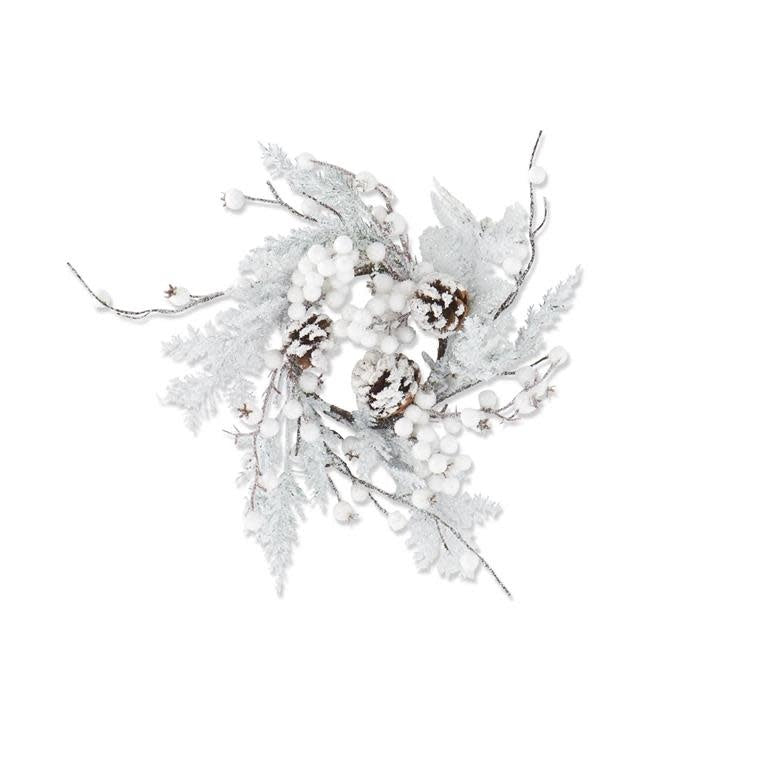 Glittered flocked pine candle ring with white berries and pinecone accents on a plastic base