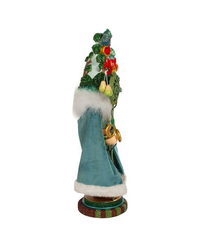 Wooden nutcracker shaped like a glittered tree hat with five linked golden rings and red bows.