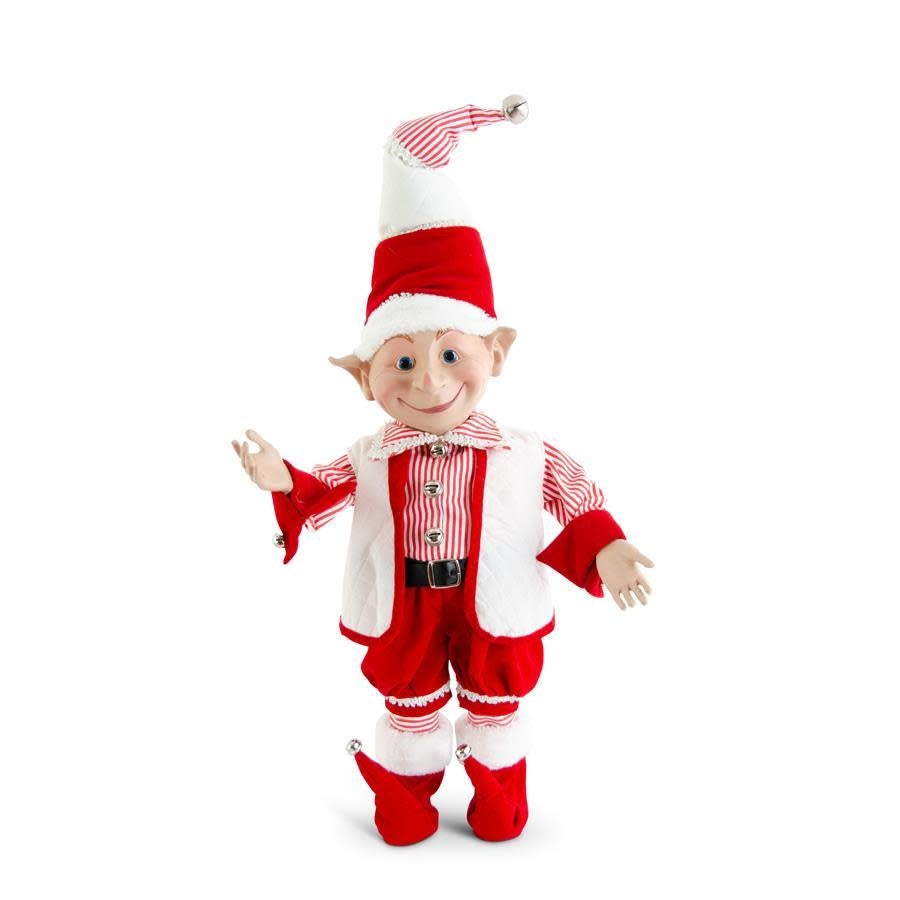 Posable elf figurine in red velvet outfit with gold bell accents on a festive holiday display.