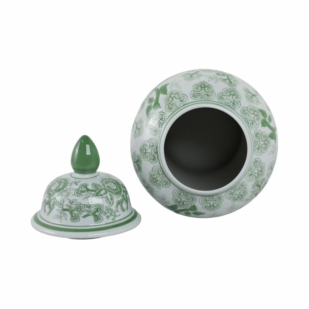 Top view of a green and white ceramic temple jar with bird and flower patterns and a separate lid.