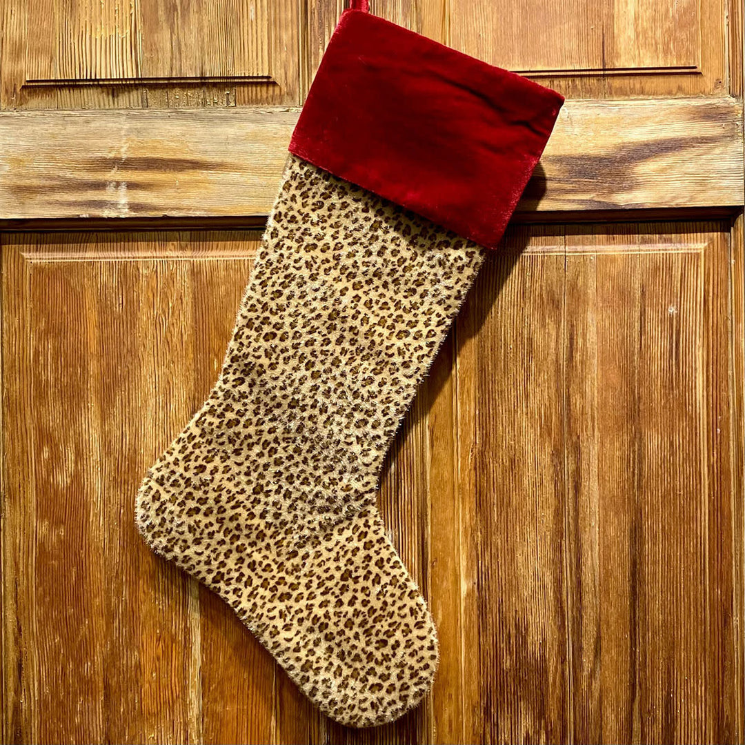 Red velvet cuff faux horsehair stocking with tan leopard print on a 23-inch leg.