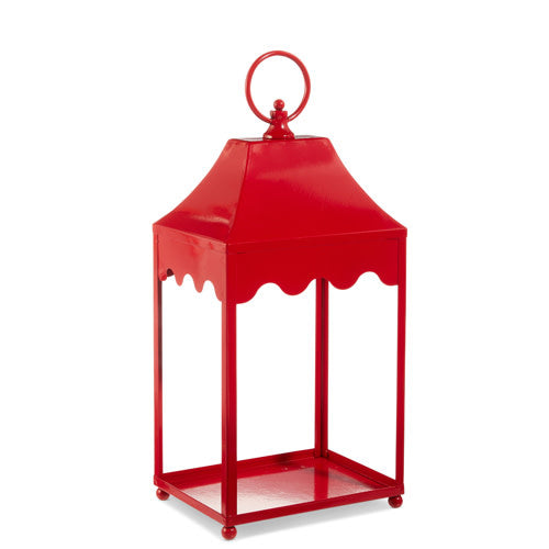 Red iron lantern with decorative cutouts measuring 8 inches wide by 6 inches deep.