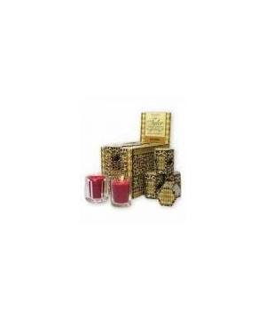 Single white votive candle in a clear glass holder with a visible wick.