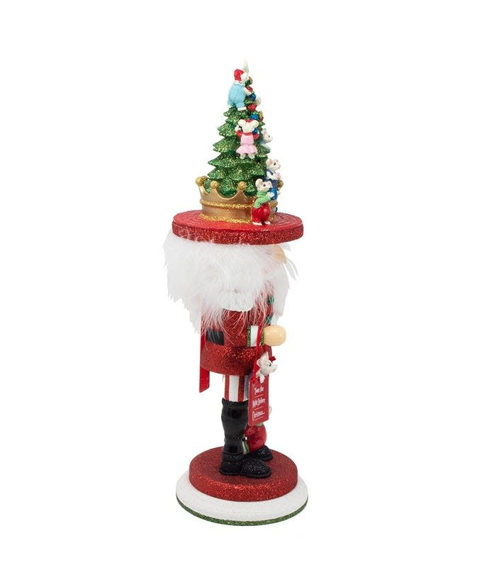 Wooden 18-inch nutcracker in red glitter outfit with tree hat; mice decorate a book displaying 'Twas The Night Before Christmas' verse.