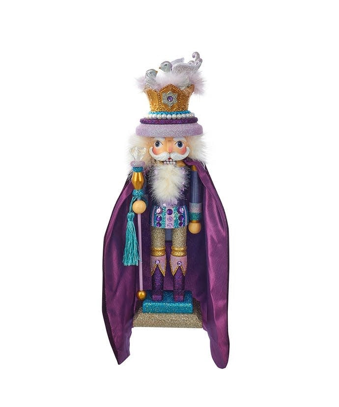 Blue, purple, and green painted nutcracker featuring a crown with two turtle doves.
