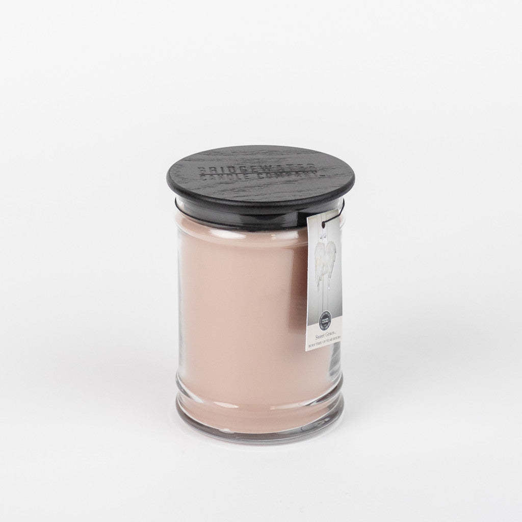 Large glass jar candle in Sweet Grace fragrance with exotic passion fruit scent