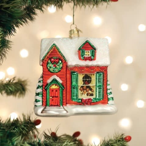Norman Rockwell You're Home! ornament featuring a figure on Grandfather's porch in warm holiday colors.