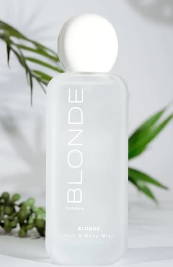 Frosted glass bottle containing Blonde Hair and Body Mist with a sleek pump dispenser.