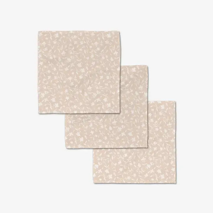 Set of waffle weave washcloths with single-sided prints and hang loops.