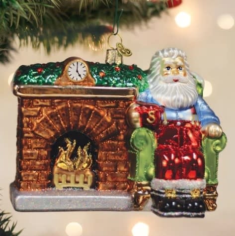 6-inch Santa Claus ornament in red suit holding a mug at the hearth.