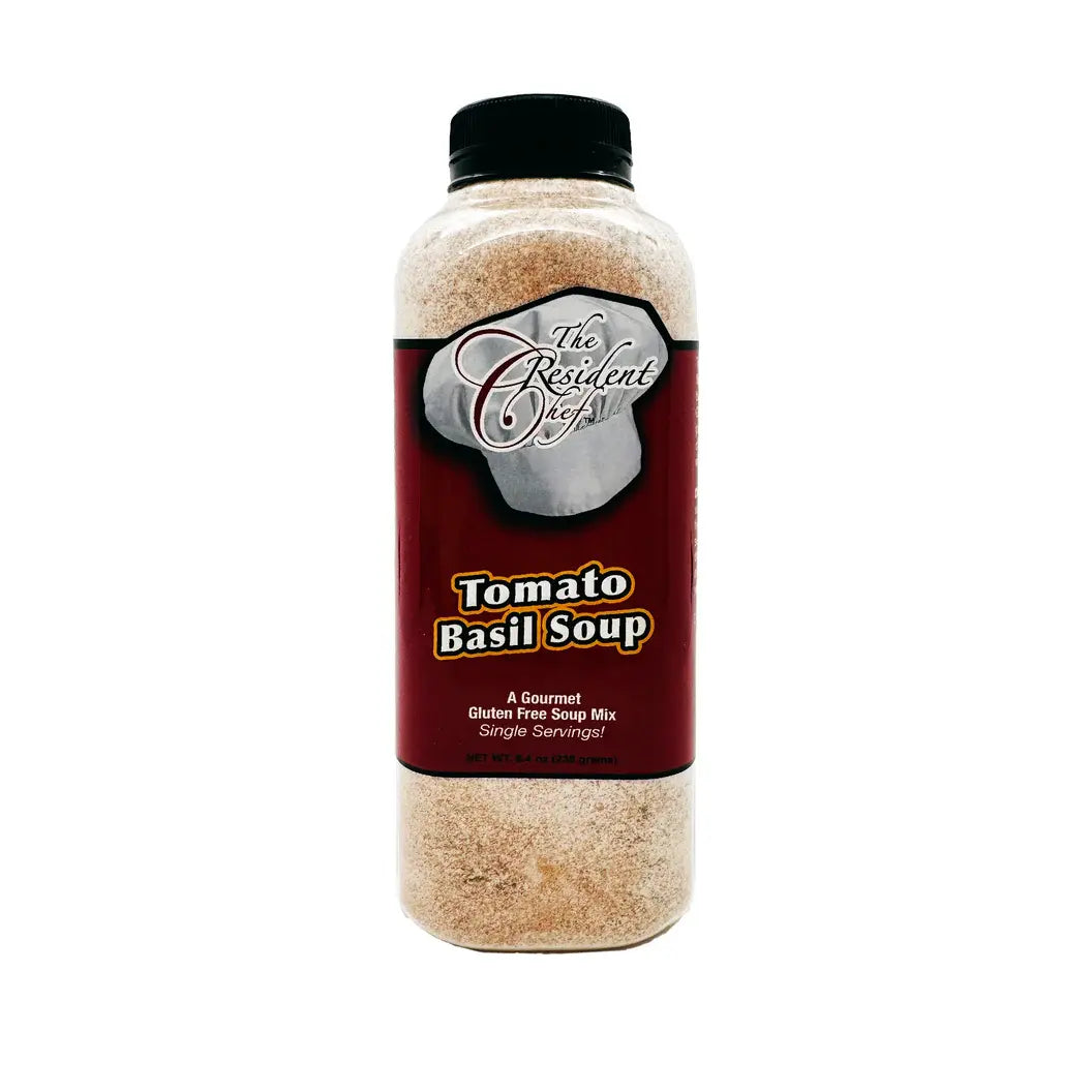 A clear plastic bottle of The Resident Chef Tomato Basil Soup mix with a black cap.