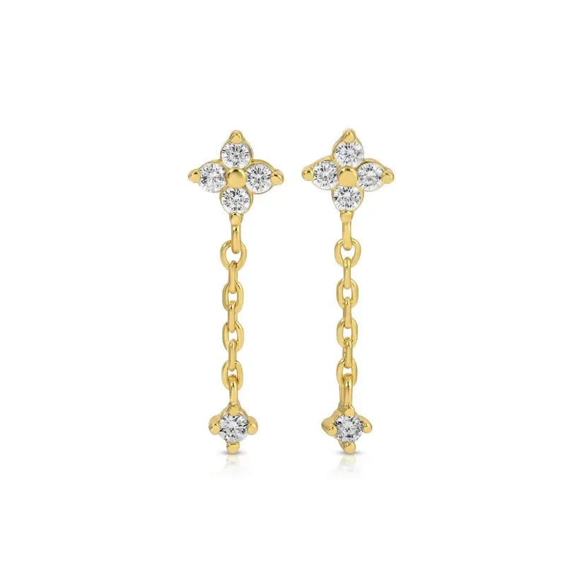 Delicate drop earrings with an 18k gold-plated brass base featuring a cubic zirconia stud and dangling chain.