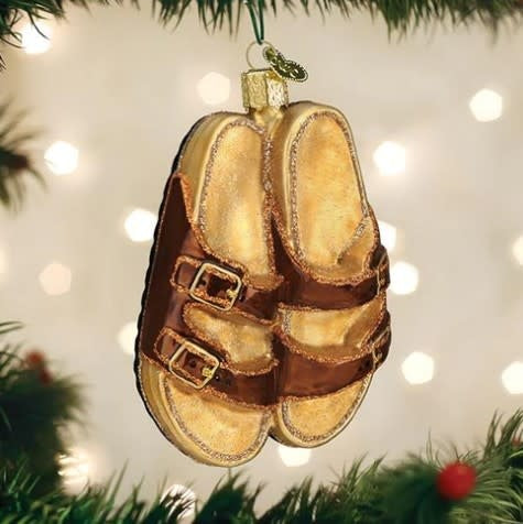 Brown leather sandals with a woven strap detail