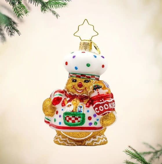 Sugary Chef Gem candy dispenser shaped like a whimsical train station with colorful windows and red roof details.