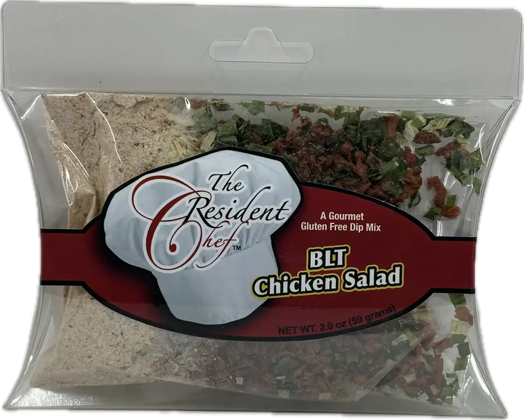 Open package showing BLT Chicken Salad mix ingredients including cream cheese, diced tomatoes, and mayonnaise.