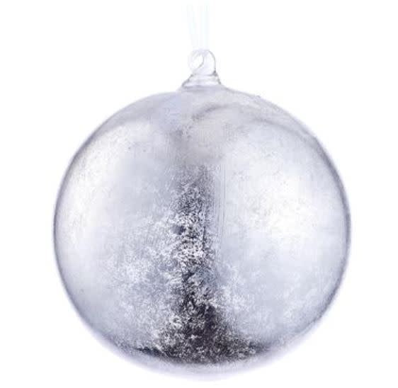 Silver glass ball ornament with a reflective spherical shape.