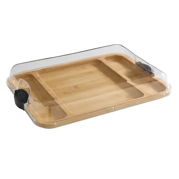 Bamboo charcuterie board with three compartments, black handles, and a clear locking plastic lid.