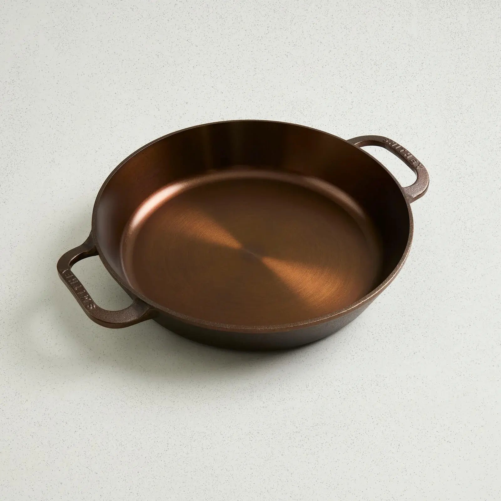 No. 12 Dual Handle Skillet with two ergonomic handles, polished satin finish, and open wall design.