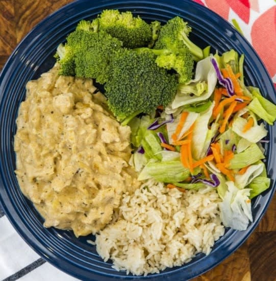 Creamy Cajun Chicken dish with visible chicken pieces in a creamy sauce.