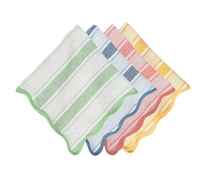 Set of four striped linen napkins with scalloped edges in candy-colored hues.