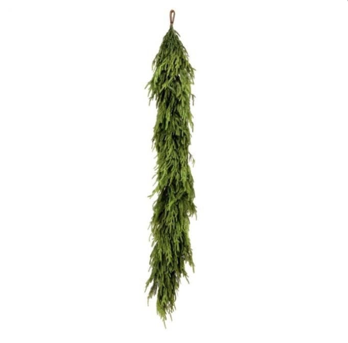 Green Norfolk pine garland with natural touch plastic needles suitable for indoor outdoor holiday decoration.