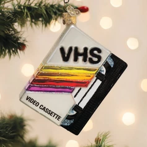 Red VHS tape ornament with silver cassette window detail