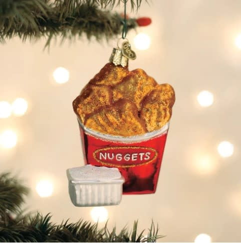 4-inch resin ornament shaped like breaded chicken nuggets with a glossy finish.