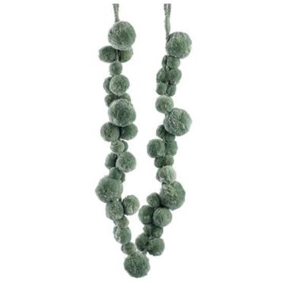 48-inch green polyester pompon garland with fluffy spherical shapes strung together.