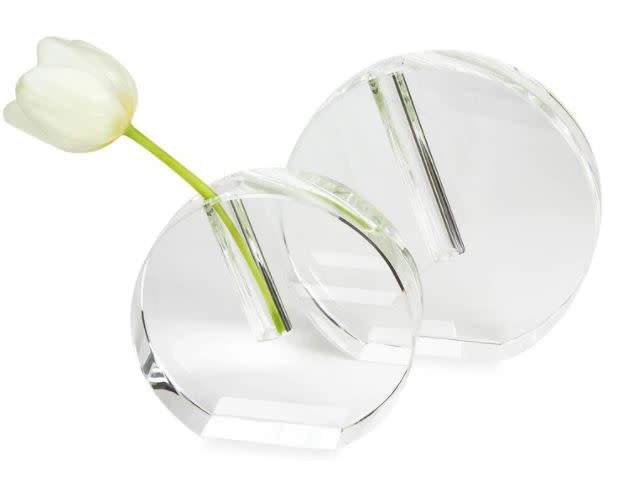 Round flat crystal glass bud vase with a clean modern transparent design