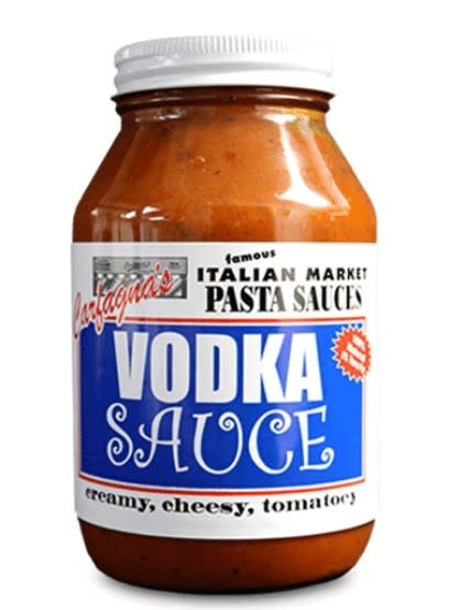 Quart jar of homemade vodka sauce with creamy tomato base