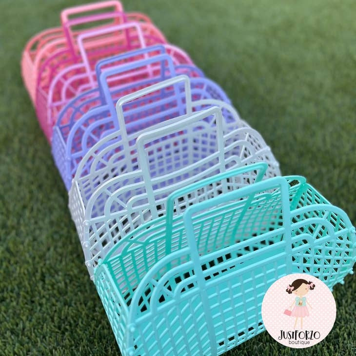 Large retro jelly basket in translucent blue with snap-bead construction.