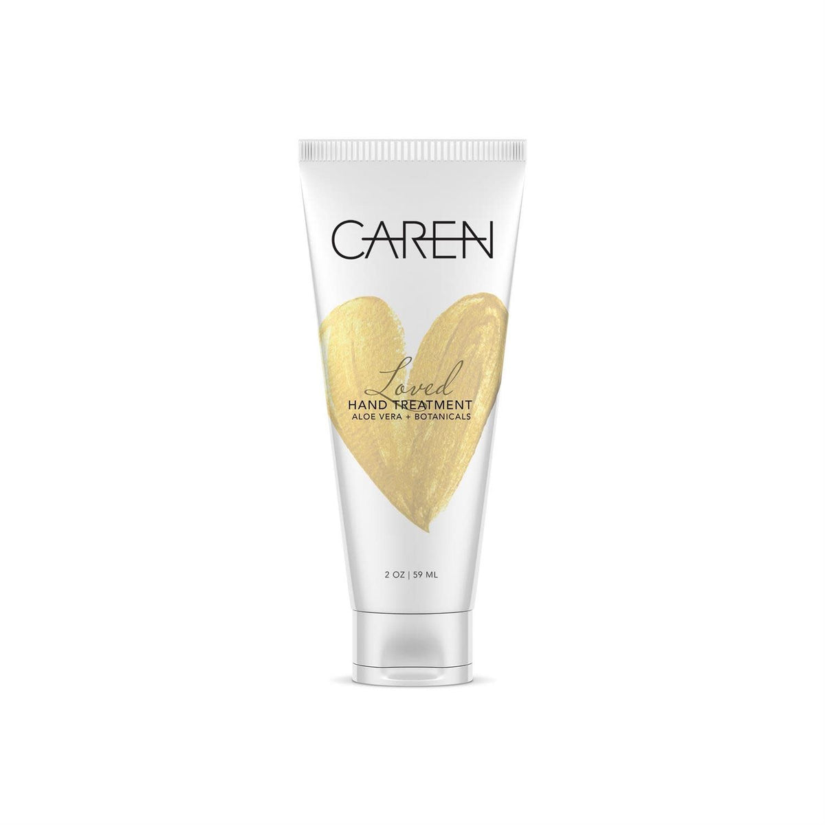 A bottle of Loved Hand Treatment in Timeless with a woody scent.