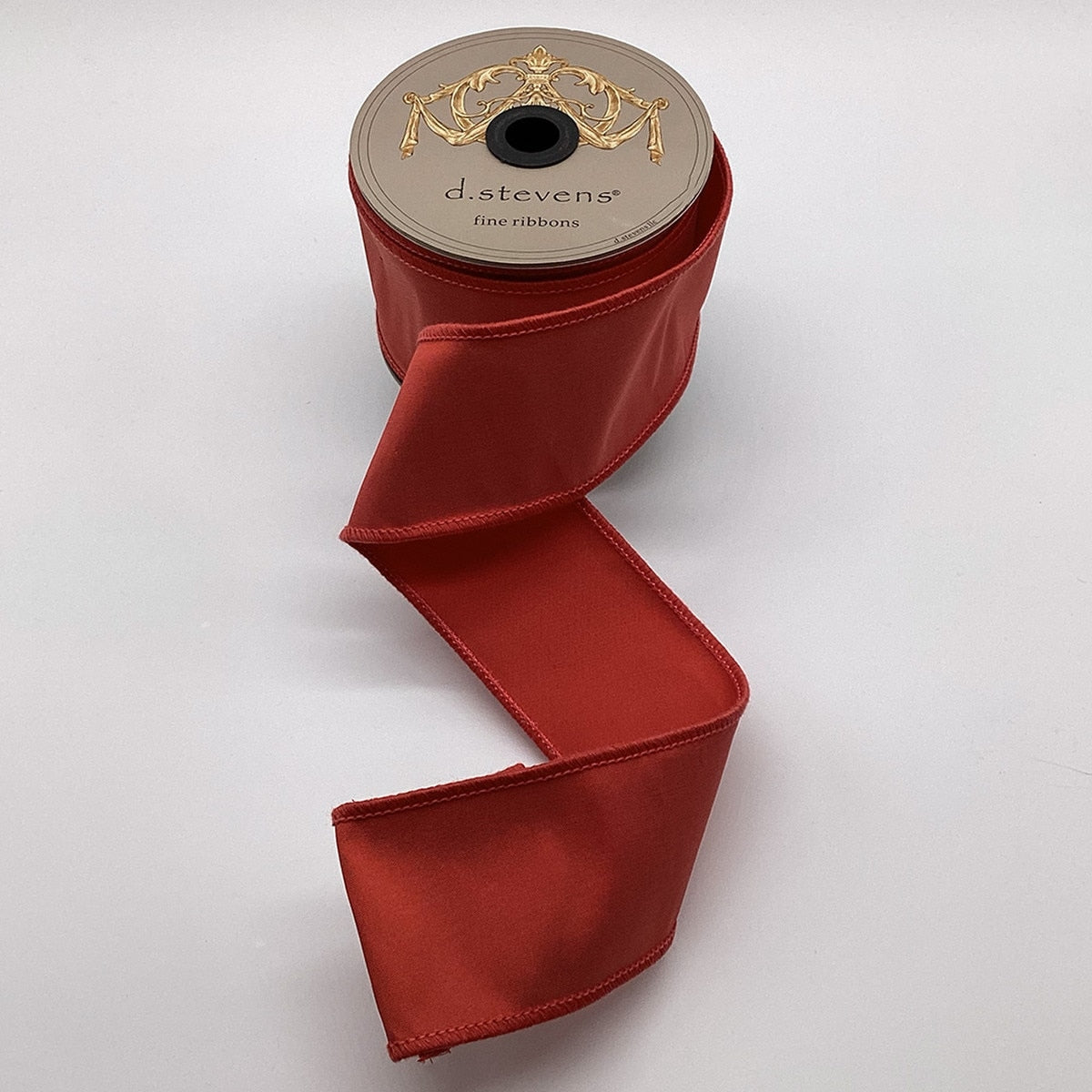 2.5 inch x 10 yards coral red taffeta double fused ribbon on a d.stevens spool.