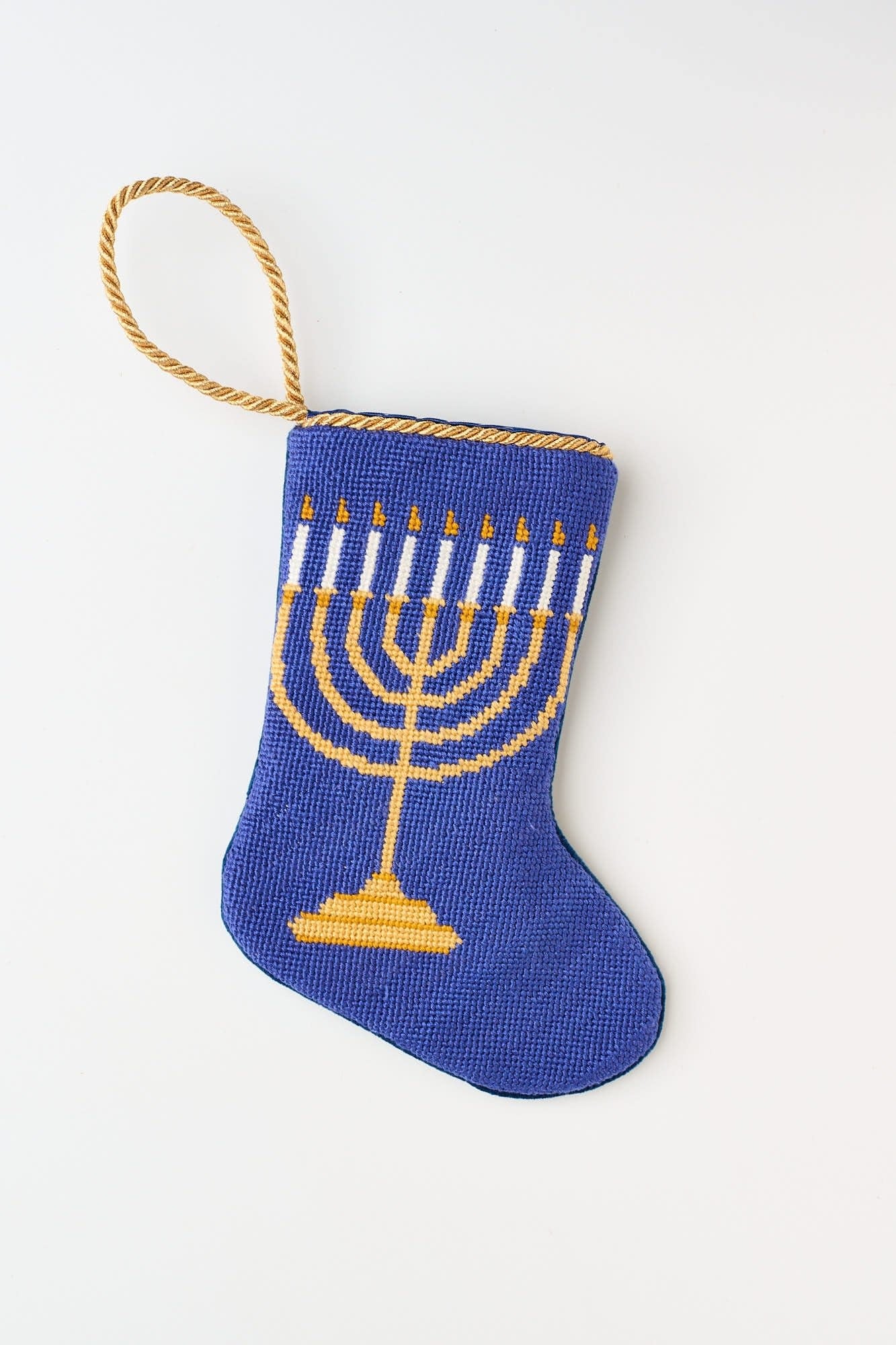 Hand-stitched needlepoint menorah stocking with cotton threads on velvet backing
