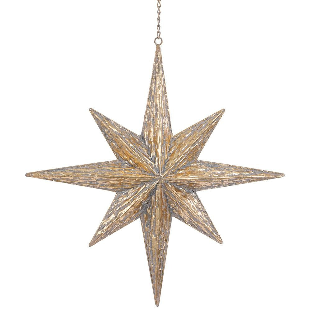 Large gold metal Star of Bethlehem ornament with a five-pointed star silhouette.
