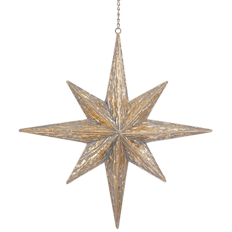 Large gold metal Star of Bethlehem ornament with a five-pointed star silhouette.