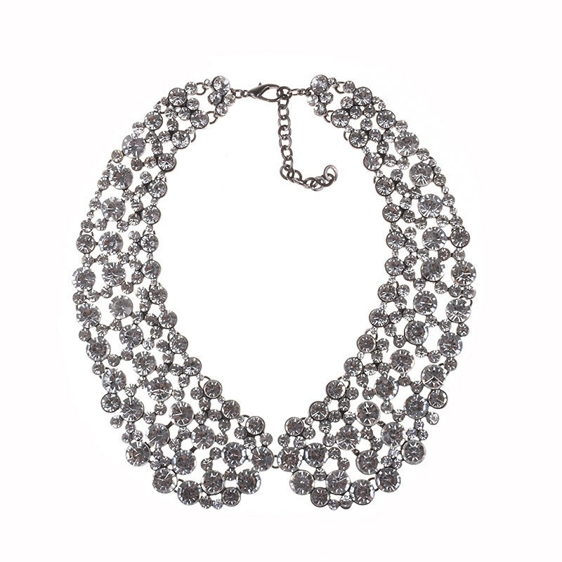 Exaggerated sparkling rhinestone collarbone chain necklace with glass crystals and lobster clasp.