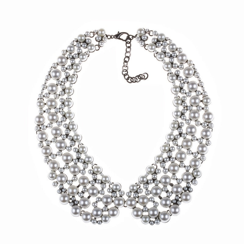 Exaggerated sparkling pearl collarbone chain necklace with three sizes of pearls and lobster clasp.