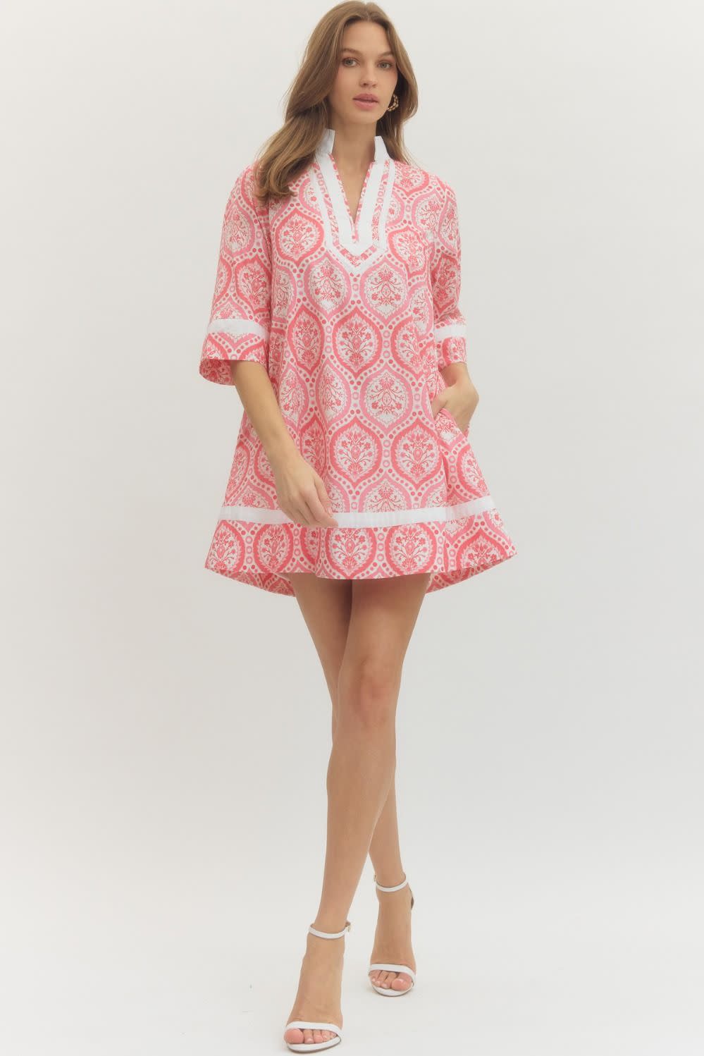 Elena botanical print mini dress with three-quarter sleeves in a floral pattern.