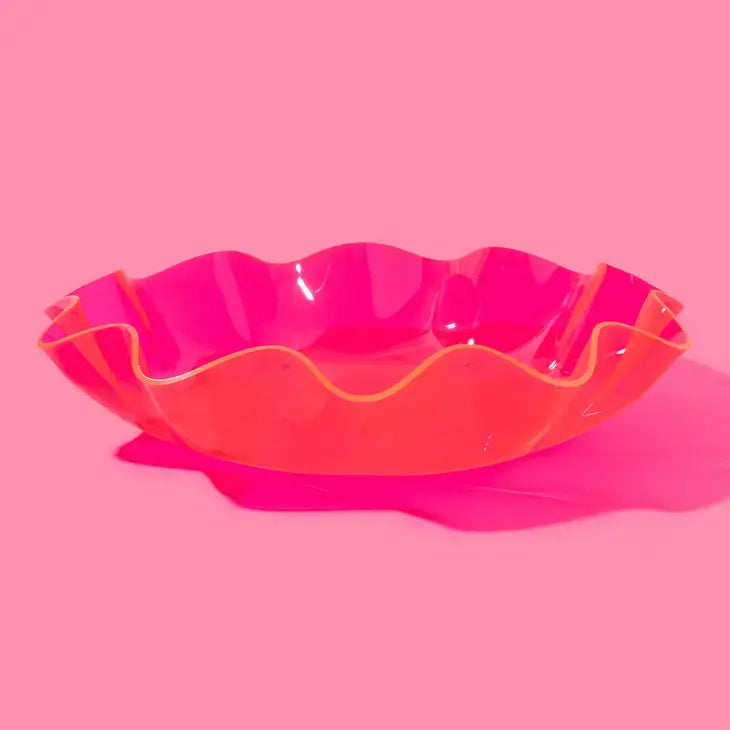 Pink acrylic nesting bowl with a round shape