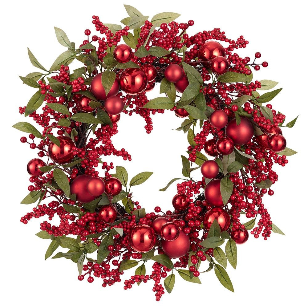 Red and green ornament ball wreath with fabric berries and climbing fern accents.