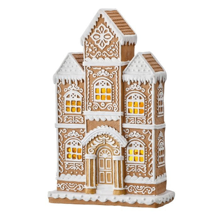 Gingerbread-style Tudor house with sugar & spice detailing and interior lighting