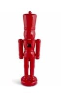 Red resin nutcracker soldier statue standing at 55.5 inches tall with a classic military silhouette.