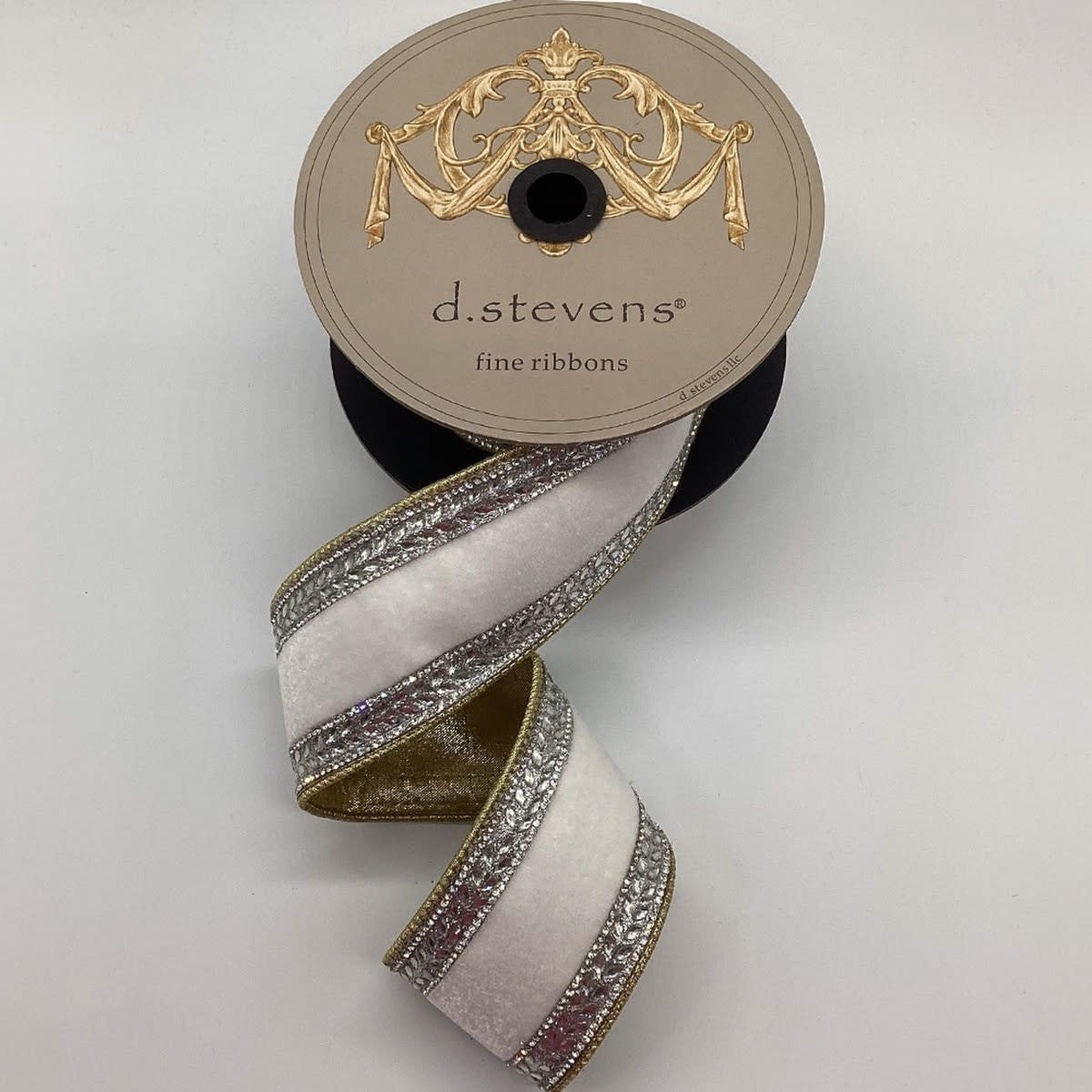 2.5-inch winter white velvet ribbon with silver crystal jewel side trim on a d.stevens spool.