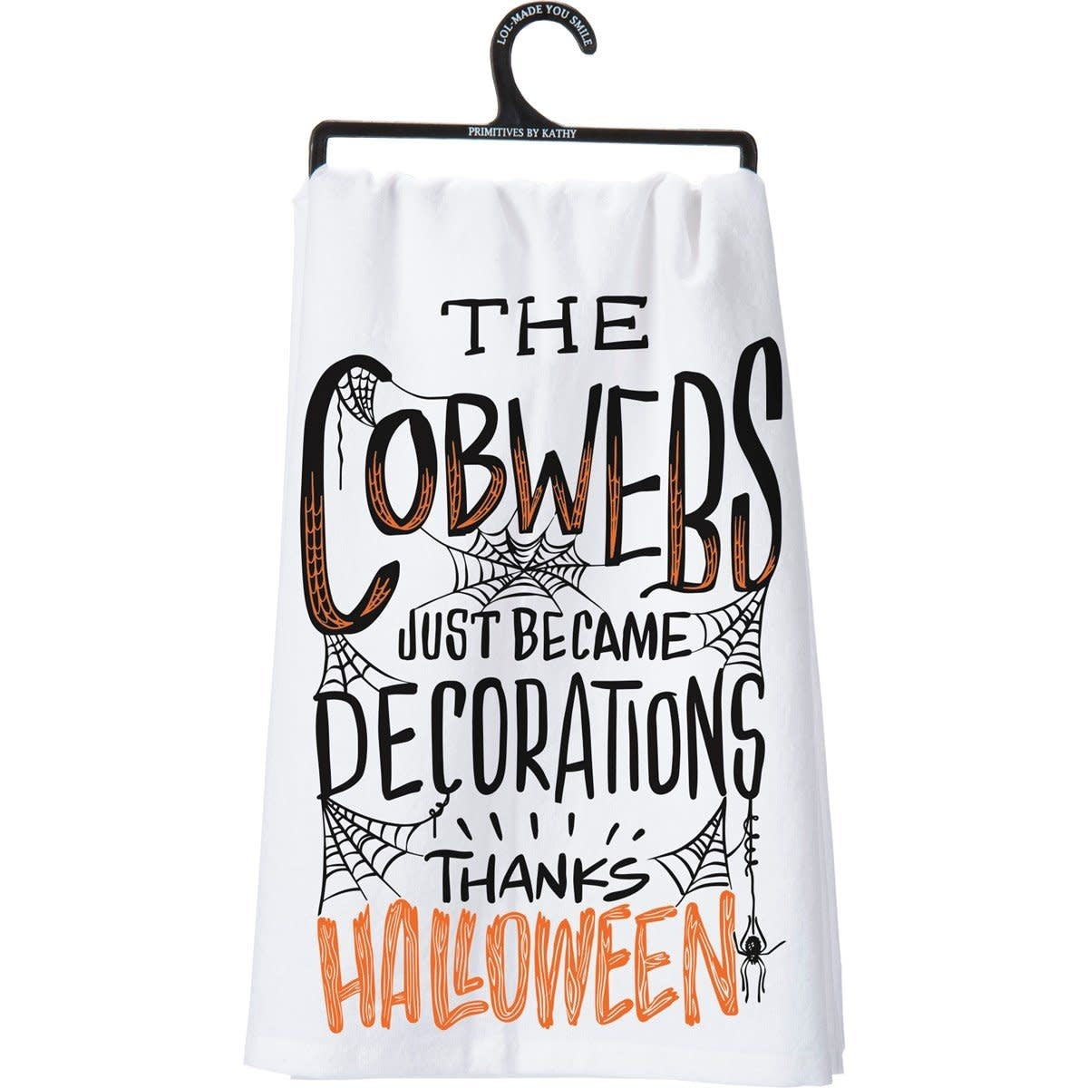 Black cotton kitchen towel with white text reading 'Remember As Far As Anyone Knows We Are A Nice & Normal Family'.